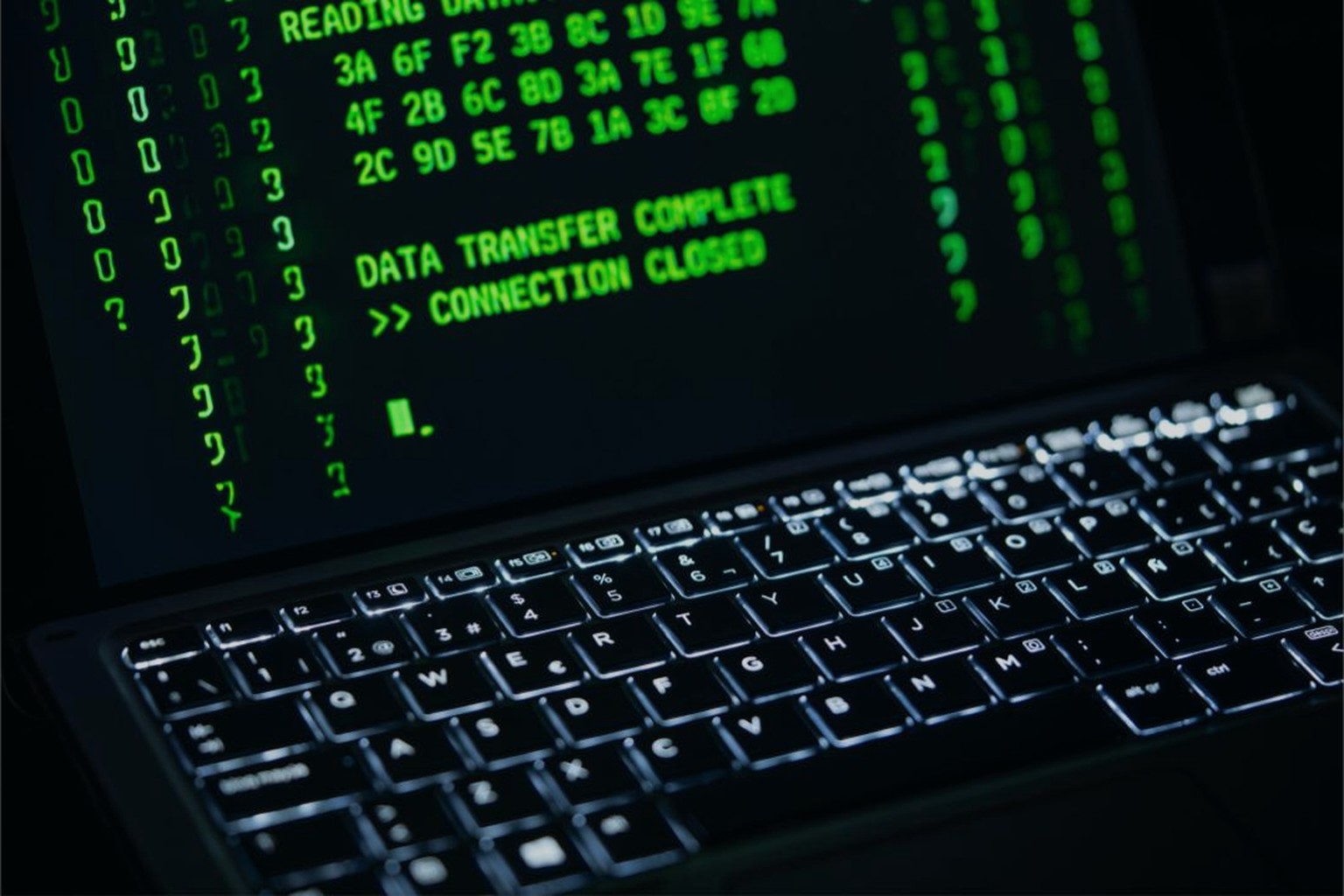 Laptop terminal showing a completed data transfer