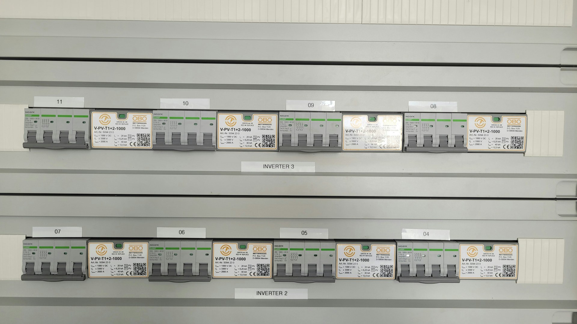 Rows of labelled circuit breakers in an electrical distribution board